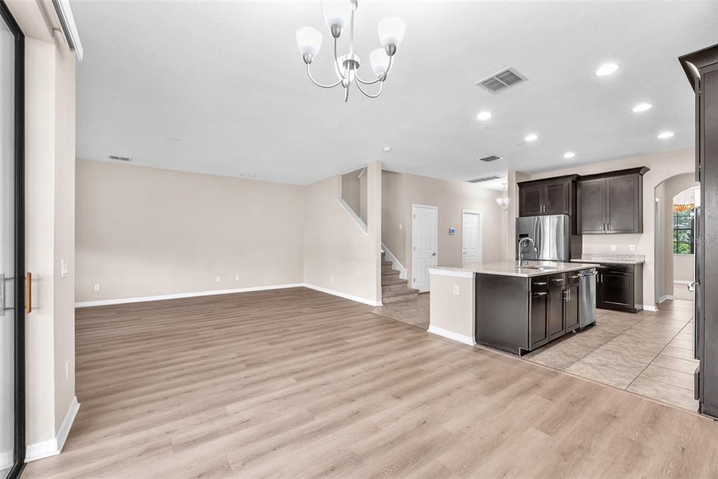 Chandelier, Interior, Kitchen, Recessed Lighting, Stainless Steel Appliances, Wood Texture Flooring