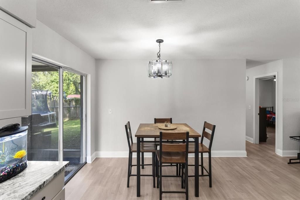 Dining room, Interior, Pendant Lights, Wood Texture Flooring