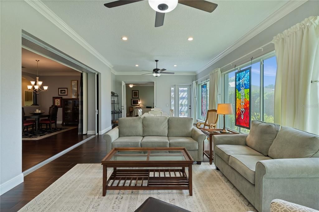 Chandelier, Dining room, Interior, Living room, Recessed Lighting, Wood Texture Flooring