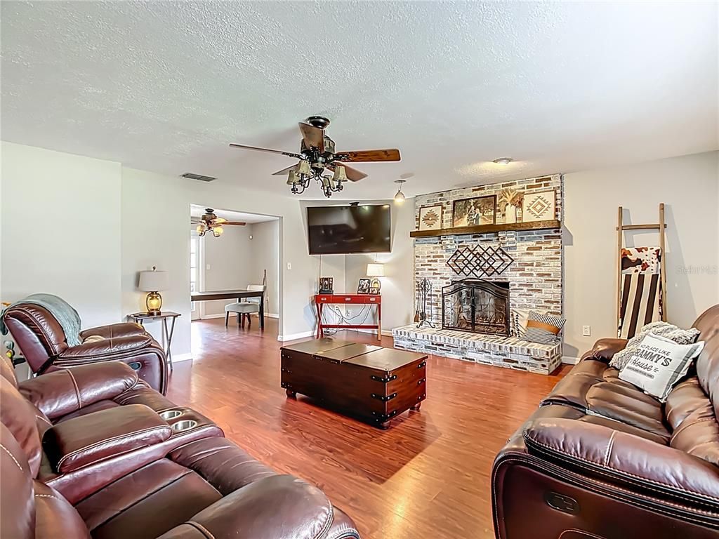 Home Theatre Room, Fireplace, Interior, Living room, Stone Walls, Wood Texture Flooring