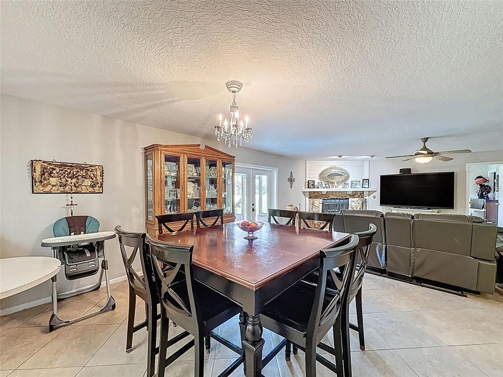Chandelier, Dining room, Fireplace, Interior, Living room