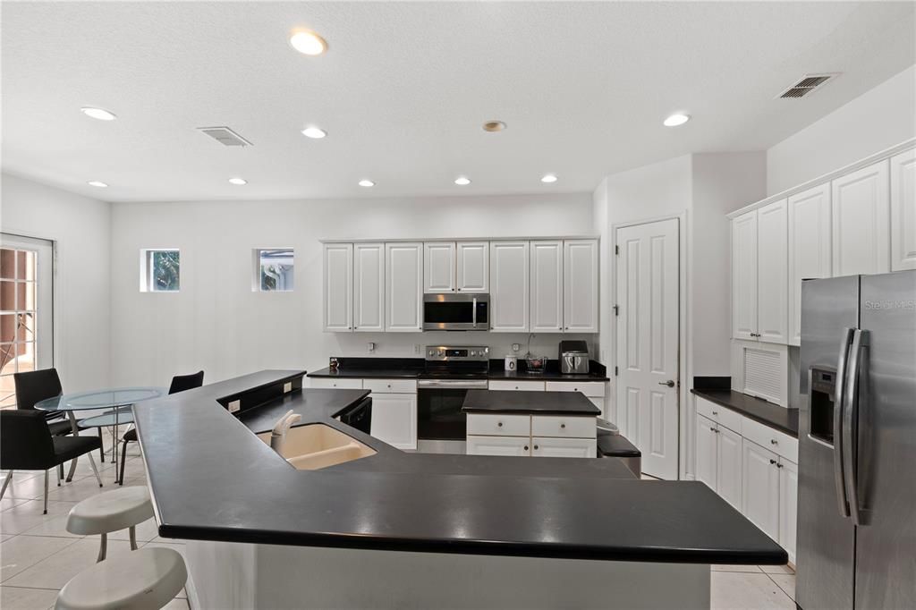 Dining room, Interior, Kitchen, Recessed Lighting, Stainless Steel Appliances