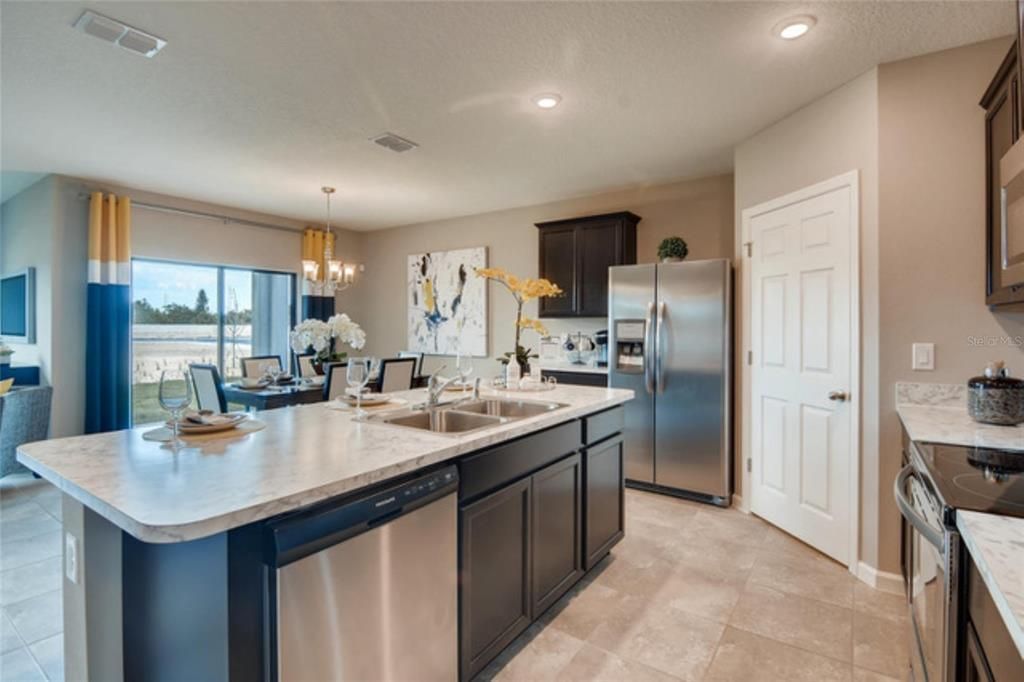 Chandelier, Dining room, Interior, Kitchen, Recessed Lighting, Stainless Steel Appliances