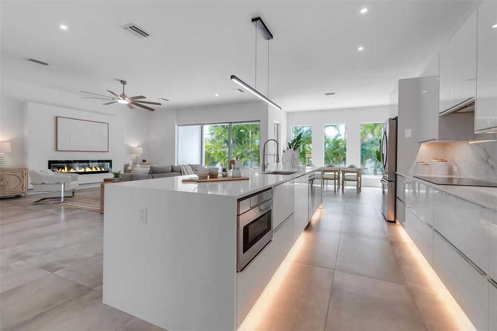 Dining room, Fireplace, Interior, Kitchen, Living room, Pendant Lights, Recessed Lighting, Stainless Steel Appliances