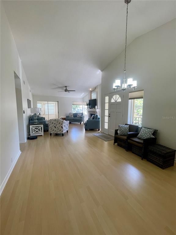 Chandelier, Fireplace, Interior, Living room, Pendant Lights, Wood Texture Flooring