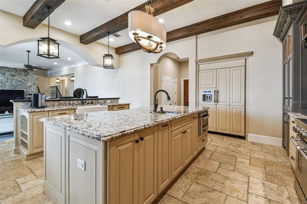 Interior, Kitchen, Pendant Lights, Recessed Lighting, Stainless Steel Appliances, Stone Walls, Wooden Beams