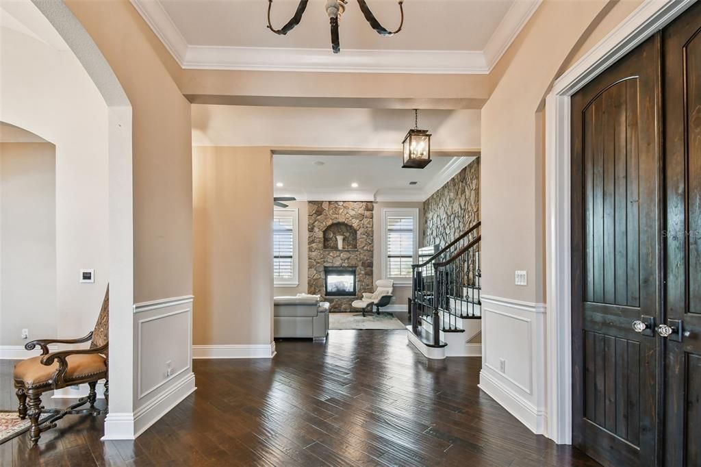 Fireplace, Interior, Living room, Pendant Lights, Recessed Lighting, Stone Walls, Wood Texture Flooring