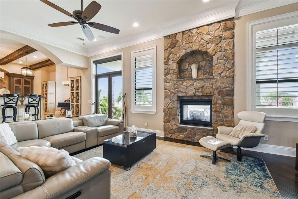 Fireplace, Interior, Kitchen, Living room, Pendant Lights, Recessed Lighting, Stone Walls, Wood Texture Flooring