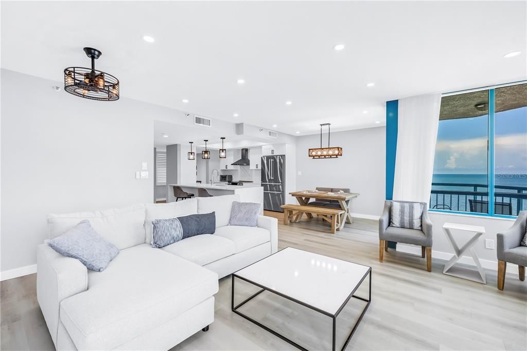 Dining room, Interior, Kitchen, Living room, Pendant Lights, Recessed Lighting, Stainless Steel Appliances, Water, Wood Texture Flooring