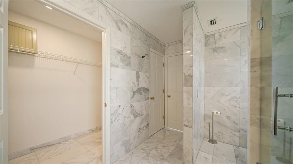 Bathroom, Glass Shower, Interior, Marble, Marble Walls, Recessed Lighting, Walk-in Closets