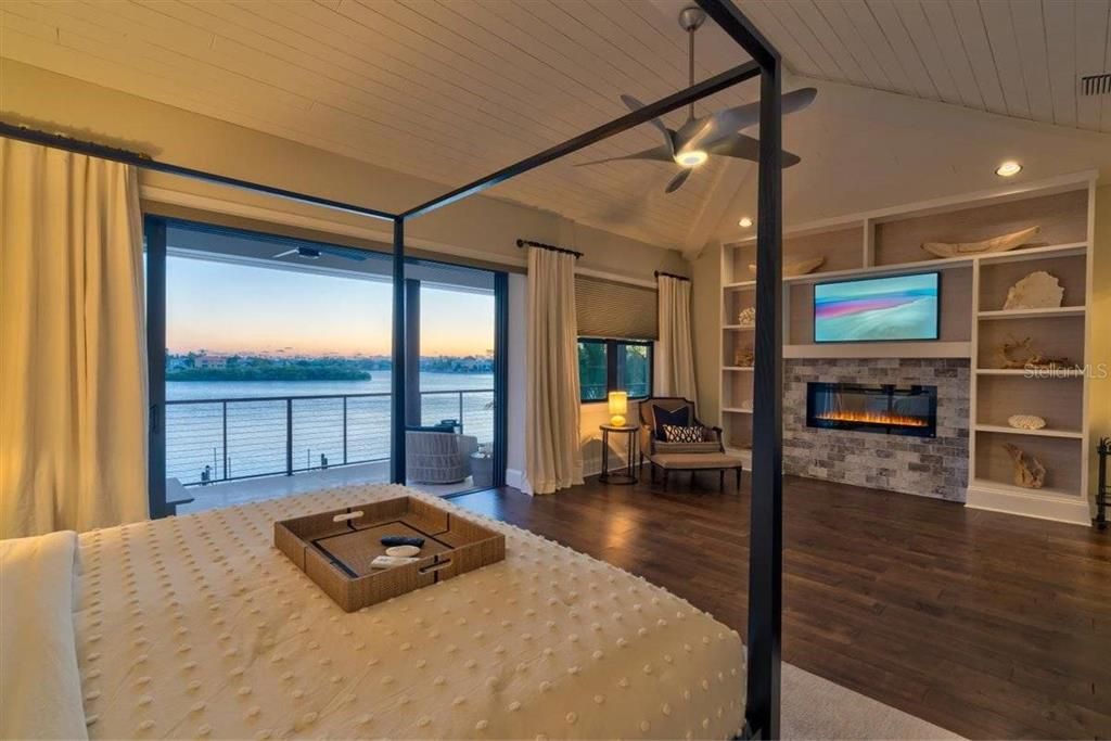Fireplace, Interior, Living room, Recessed Lighting, Water, Wood Texture Flooring