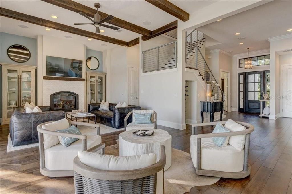 Fireplace, Interior, Living room, Pendant Lights, Recessed Lighting, Wooden Beams, Wood Texture Flooring