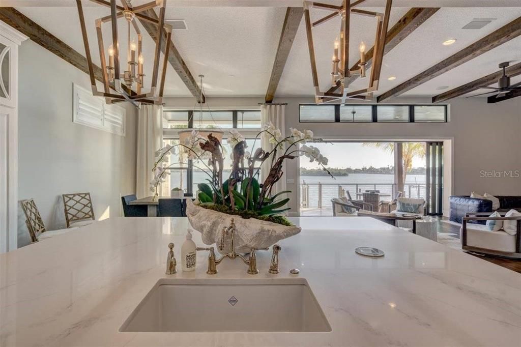 Chandelier, Dining room, Interior, Kitchen, Recessed Lighting, Water, Wooden Beams