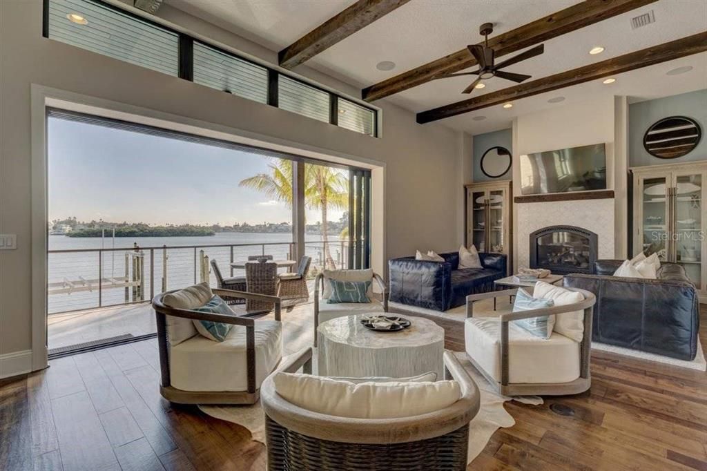 Fireplace, Interior, Living room, Recessed Lighting, Water, Wooden Beams, Wood Texture Flooring