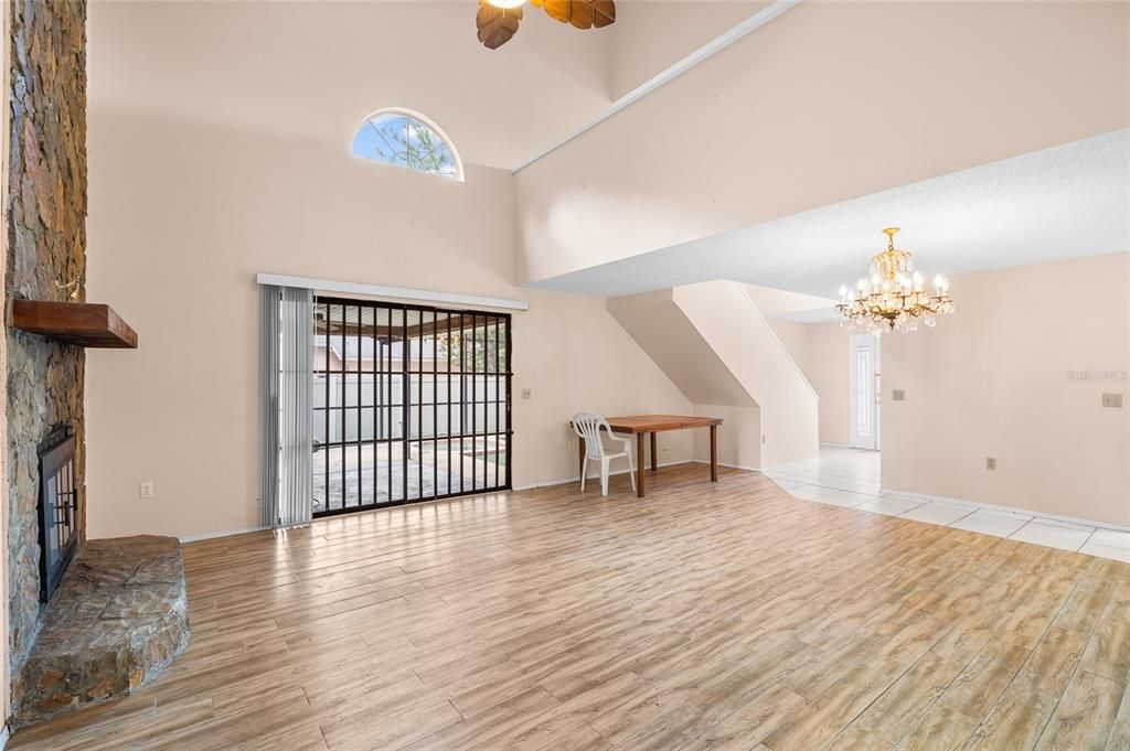 Chandelier, Empty room, Fireplace, Interior, Wood Texture Flooring