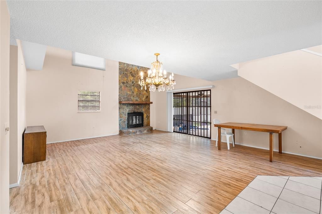 Chandelier, Empty room, Fireplace, Interior, Wood Texture Flooring