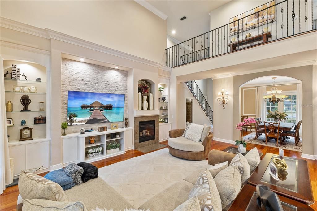 Chandelier, Dining room, Fireplace, Interior, Living room, Recessed Lighting, Wood Texture Flooring