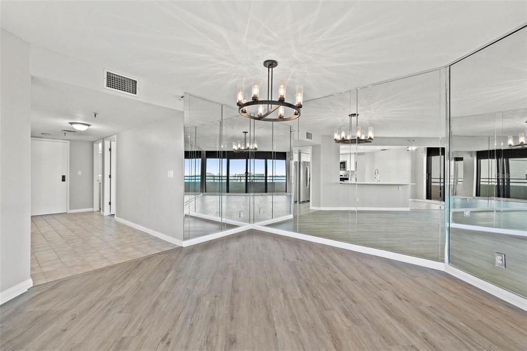 Chandelier, Empty room, Interior, Kitchen, Pendant Lights, Stainless Steel Appliances, Wood Texture Flooring