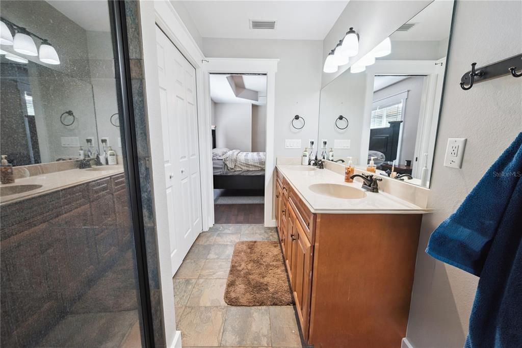 Bathroom, Bedroom, Dual Sink Vanities, Glass Shower, Interior, Wood Texture Flooring