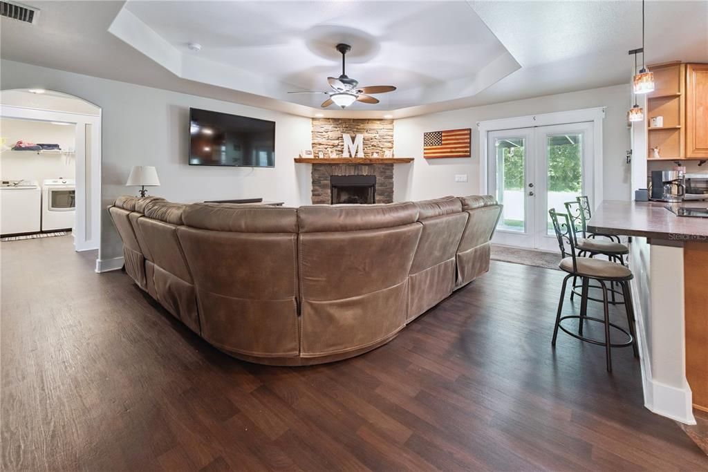 Dining room, Fireplace, Interior, Kitchen, Living room, Pendant Lights, Wood Texture Flooring