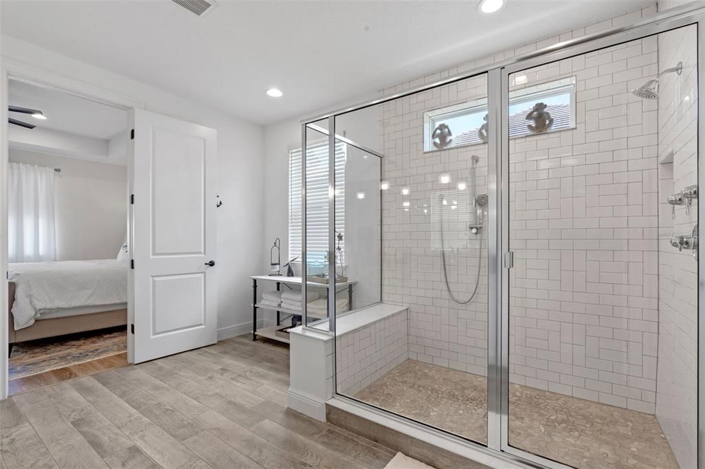 Bathroom, Bedroom, Glass Shower, Interior, Recessed Lighting, Wood Texture Flooring
