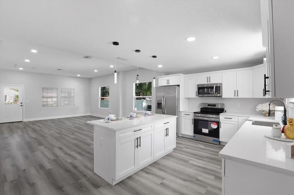 Interior, Kitchen, Pendant Lights, Recessed Lighting, Stainless Steel Appliances, Wood Texture Flooring