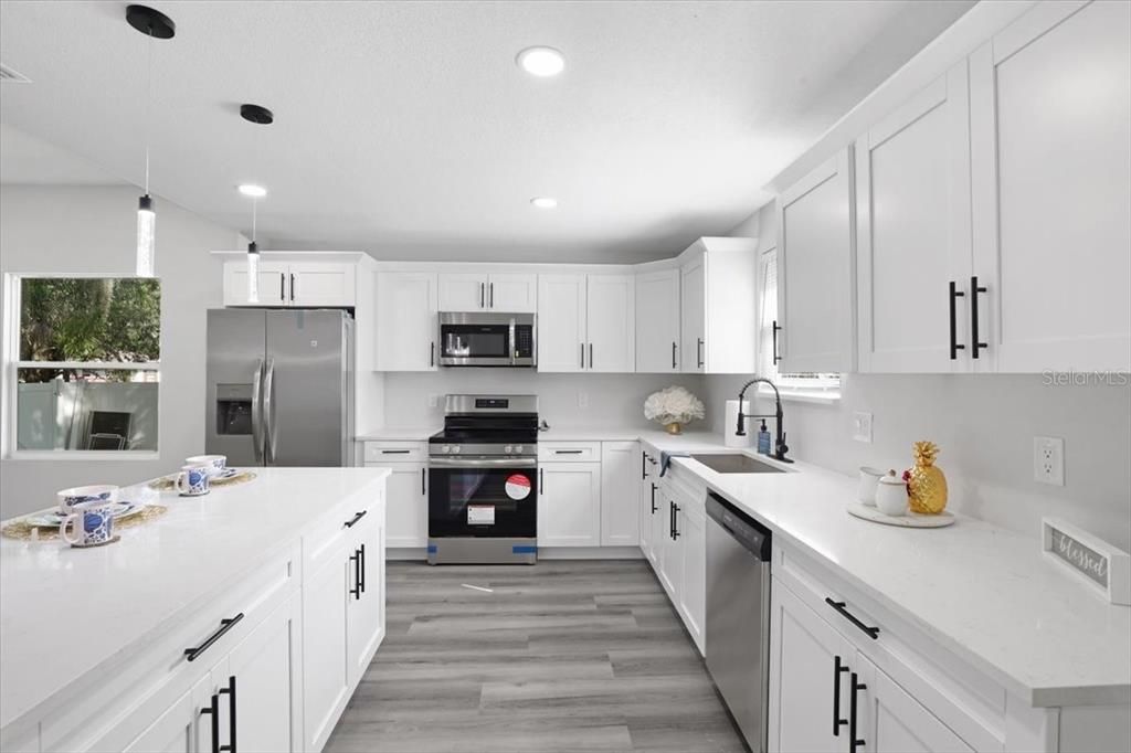 Interior, Kitchen, Pendant Lights, Recessed Lighting, Stainless Steel Appliances, Wood Texture Flooring