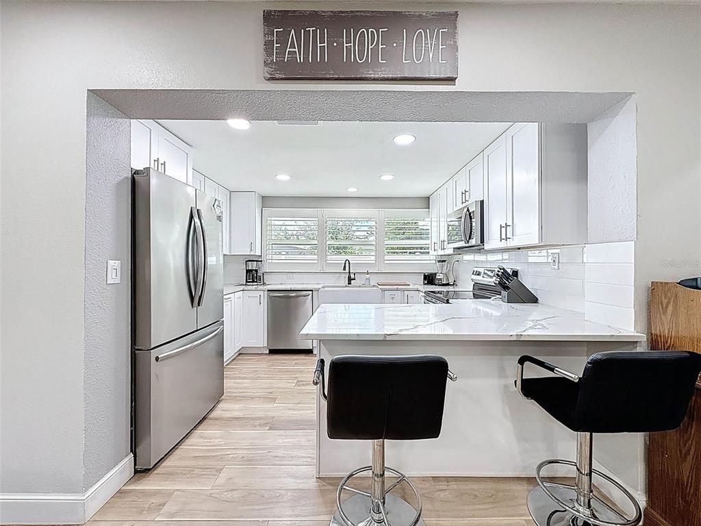 Interior, Kitchen, Recessed Lighting, Stainless Steel Appliances, Wood Texture Flooring