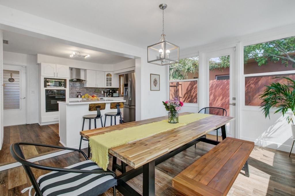 Dining room, Interior, Kitchen, Pendant Lights, Stainless Steel Appliances, Wood Texture Flooring