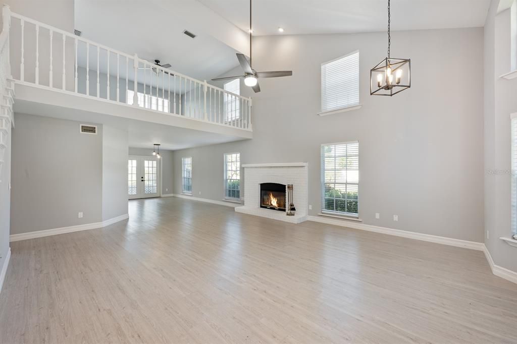 Fireplace, Interior, Pendant Lights, Recessed Lighting, Wood Texture Flooring
