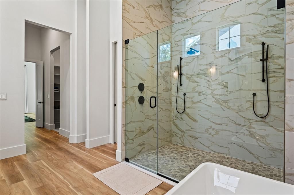 Bathroom, Glass Shower, Interior, Marble Walls, Wood Texture Flooring
