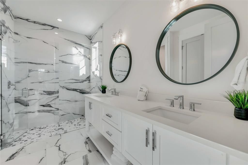 Bathroom, Dual Sink Vanities, Interior, Marble, Marble Walls, Recessed Lighting