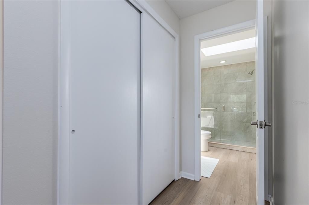Bathroom, Glass Shower, Interior, Recessed Lighting, Wood Texture Flooring