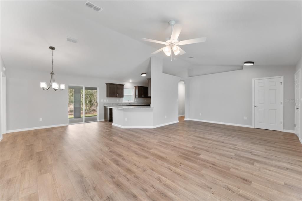 Chandelier, Empty room, Interior, Kitchen, Pendant Lights, Recessed Lighting, Wood Texture Flooring