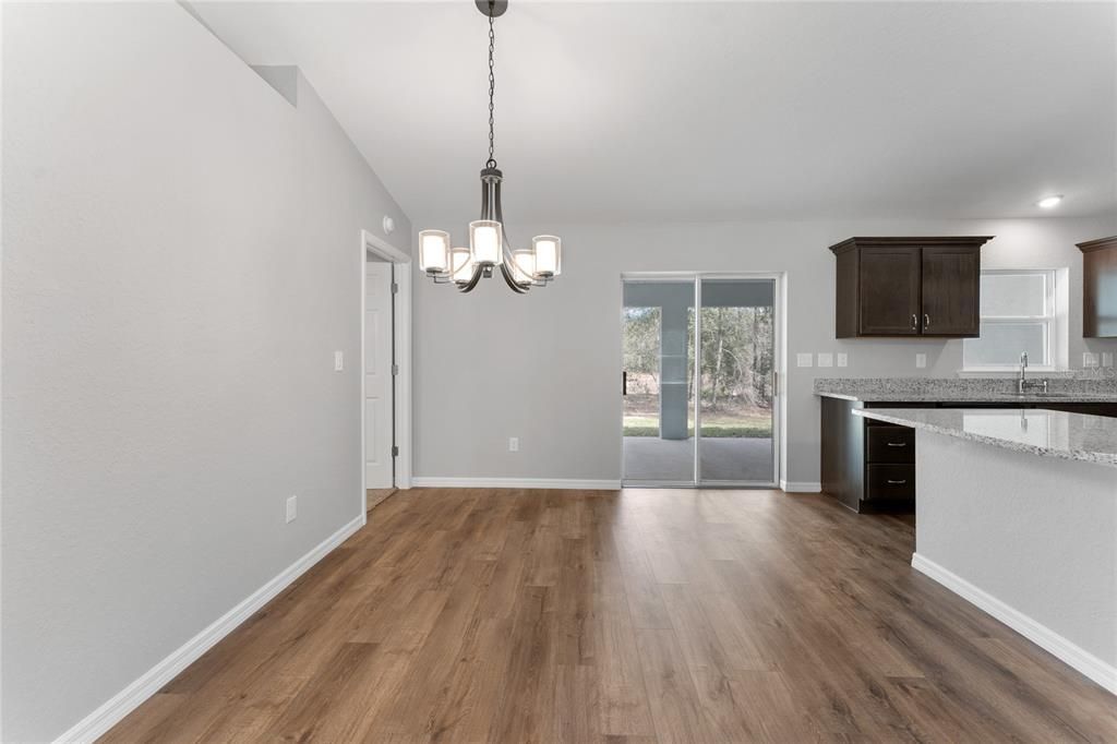 Chandelier, Empty room, Interior, Kitchen, Pendant Lights, Recessed Lighting, Wood Texture Flooring