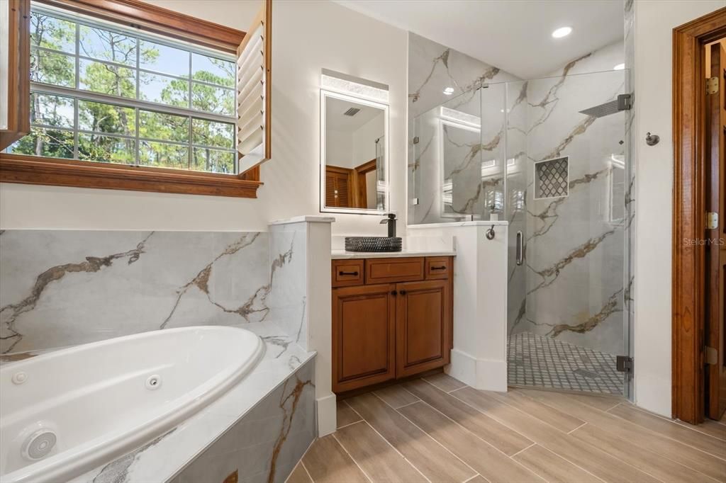 Bathroom, Glass Shower, Interior, Marble Walls, Recessed Lighting, Wood Texture Flooring