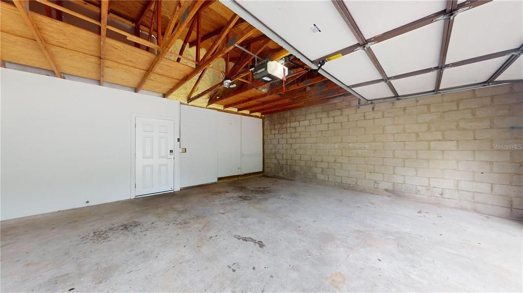 Garage, Interior, Stone Walls, Wooden Beams