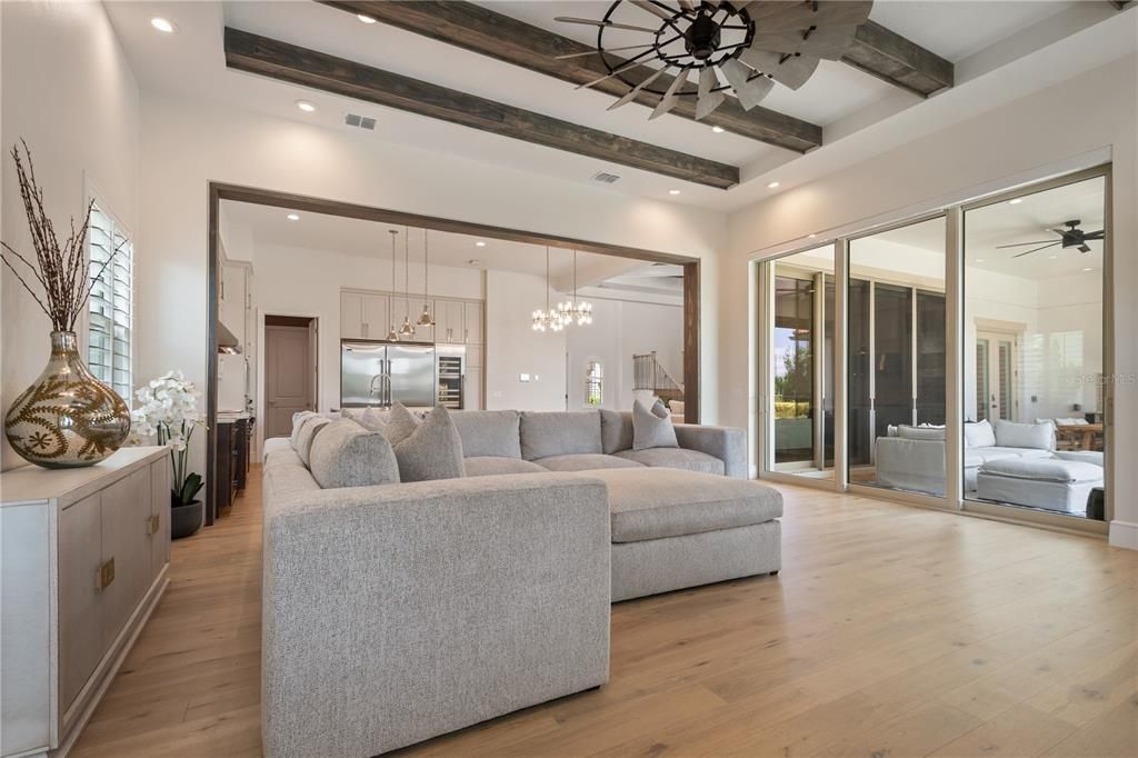 Interior, Kitchen, Living room, Pendant Lights, Recessed Lighting, Stainless Steel Appliances, Wooden Beams, Wood Texture Flooring
