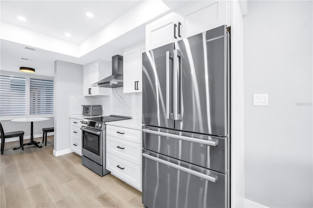Interior, Kitchen, Recessed Lighting, Stainless Steel Appliances, Wood Texture Flooring