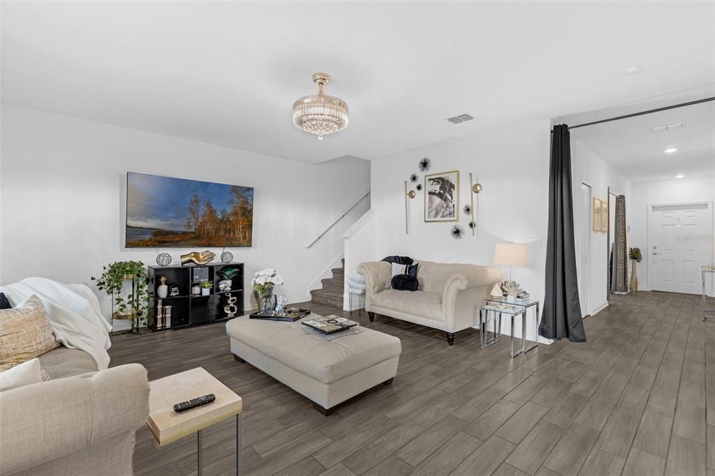 Chandelier, Interior, Living room, Recessed Lighting, Wood Texture Flooring