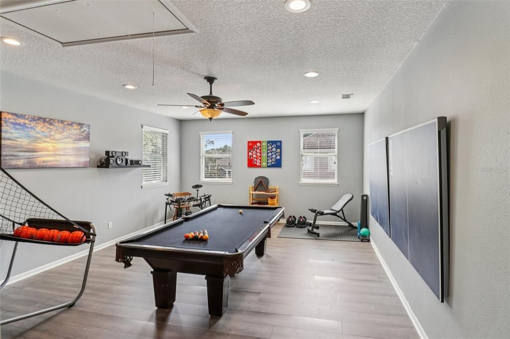 Billiard Table, Fitness Equipment, Game Room, Interior, Recessed Lighting, Wood Texture Flooring
