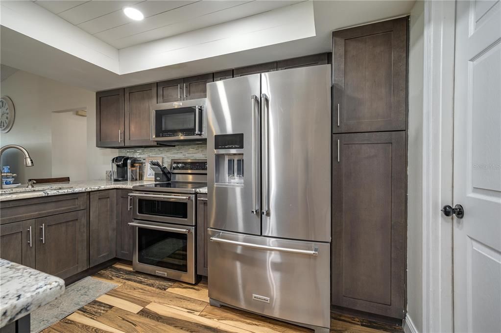 Interior, Kitchen, Recessed Lighting, Stainless Steel Appliances, Wood Texture Flooring