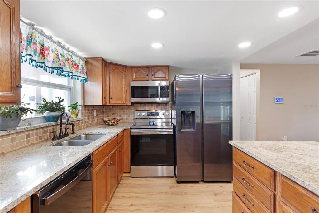 Interior, Kitchen, Recessed Lighting, Stainless Steel Appliances, Wood Texture Flooring
