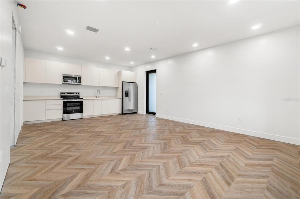 Interior, Kitchen, Recessed Lighting, Stainless Steel Appliances, Wood Texture Flooring