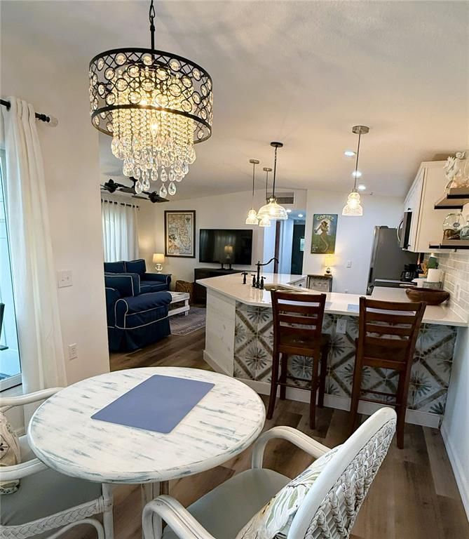 Chandelier, Dining room, Interior, Kitchen, Living room, Pendant Lights, Recessed Lighting, Wood Texture Flooring