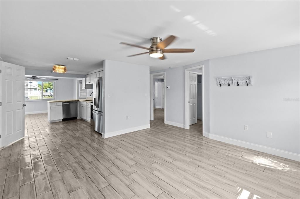Empty room, Interior, Kitchen, Stainless Steel Appliances, Wood Texture Flooring