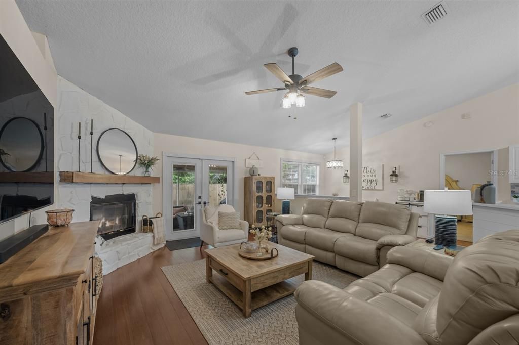 Dining room, Fireplace, Interior, Living room, Pendant Lights, Wood Texture Flooring