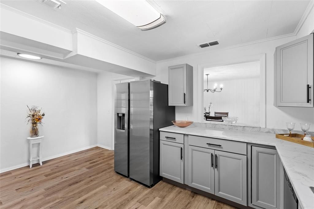 Chandelier, Interior, Kitchen, Recessed Lighting, Stainless Steel Appliances, Wood Texture Flooring