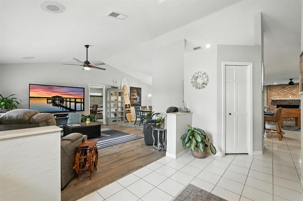 Dining room, Fireplace, Interior, Living room, Recessed Lighting, Wood Texture Flooring