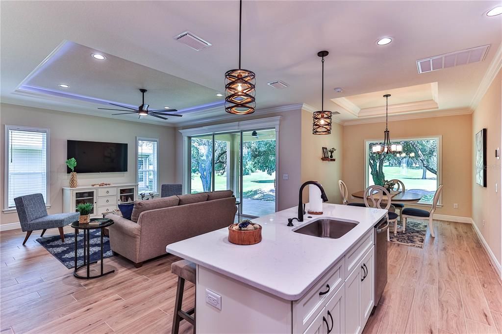 Chandelier, Dining room, Interior, Kitchen, Living room, Pendant Lights, Recessed Lighting, Wood Texture Flooring